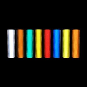 Reflective sheeting rolls in multiple colors shown against a dark background