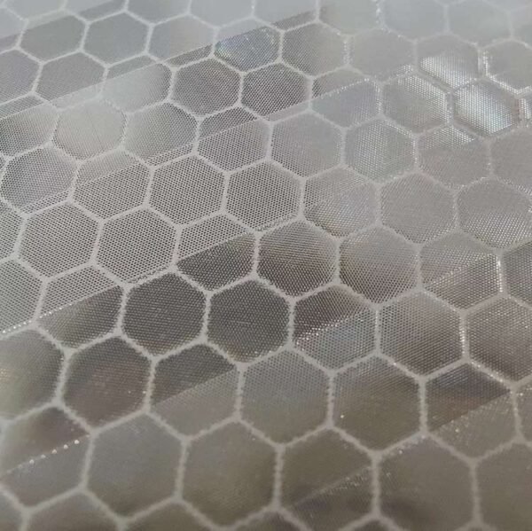 Clean close-up of the white honeycomb reflective surface