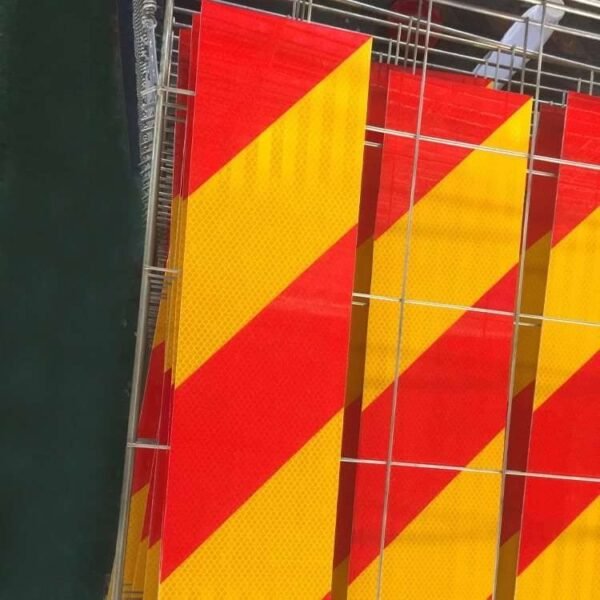 Close view of red and yellow diagonal warning panels