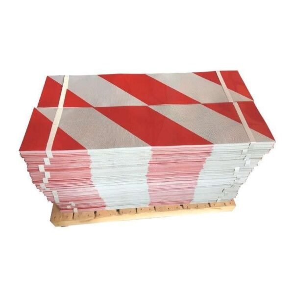 Stacked red and white diagonal reflective warning panels