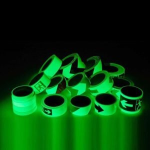 Printed arrow and exit marking tapes showing green afterglow