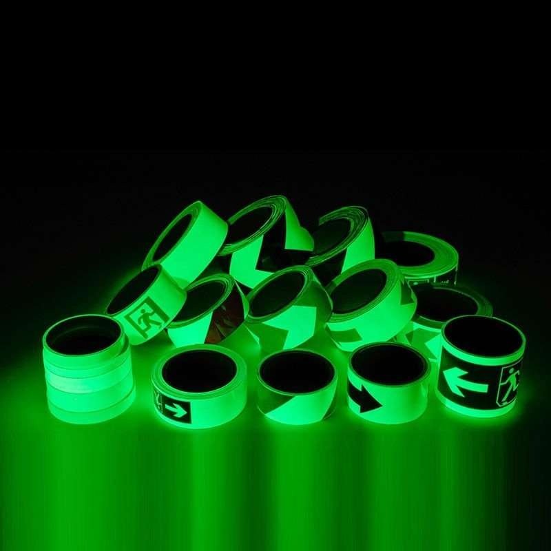 Printed arrow and exit marking tapes showing green afterglow