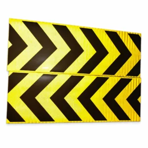Yellow and black chevron sticker samples photographed under incident light